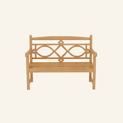 Chelsea teak garden bench with scrolled back beside a garden path