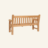 Colton bench shown from the rear, solid teak construction