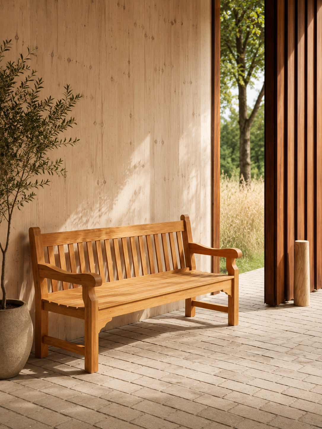 Exbury bench on a patio, solid Grade-A teak outdoor bench