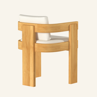 Canvas Forma dining armchair rear view, showing solid teak frame construction