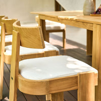 Canvas Forma dining chair in an outdoor terrace setting