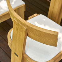 Canvas Forma dining chair in an outdoor garden setting
