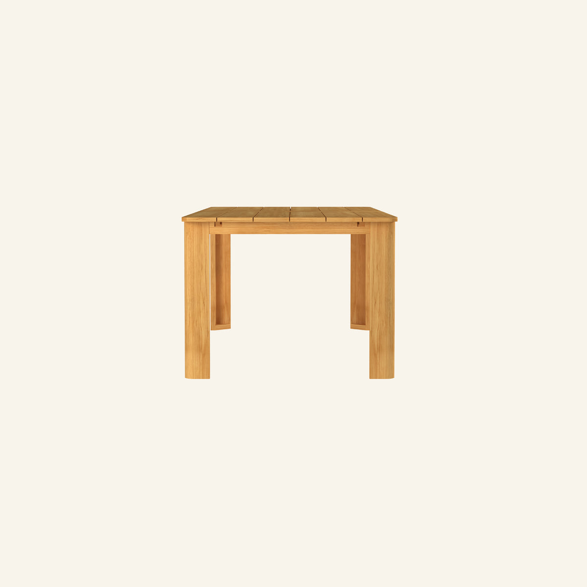 Forma dining table from the side, solid teak tabletop and base