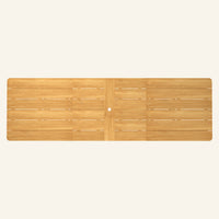 FORMA DINING TABLE shown from above, featuring a natural teak wood surface with evenly spaced slats and a centered hole for umbrella insertion.