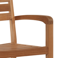 Close-up of the armrest and slatted backrest, emphasizing the chair's smooth finish and natural teak grain.