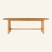Isla oval dining table from the front, solid Grade-A teak tabletop and base