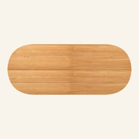Isla oval dining table from above, slatted solid teak tabletop