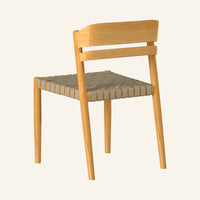 Kaia dining side chair rear view, showing solid teak frame construction