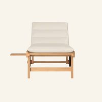 Lance sunlounger in canvas, shown from the front in solid teak