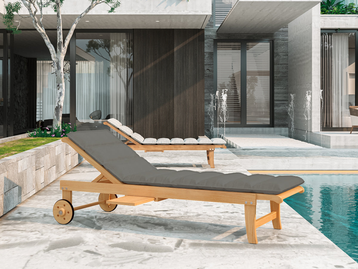 Lance sunlounger in charcoal in an outdoor pool terrace setting
