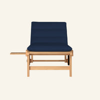 Lance sunlounger in navy, shown from the front in solid teak
