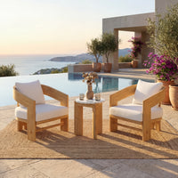 Mira lounge chair on a poolside terrace