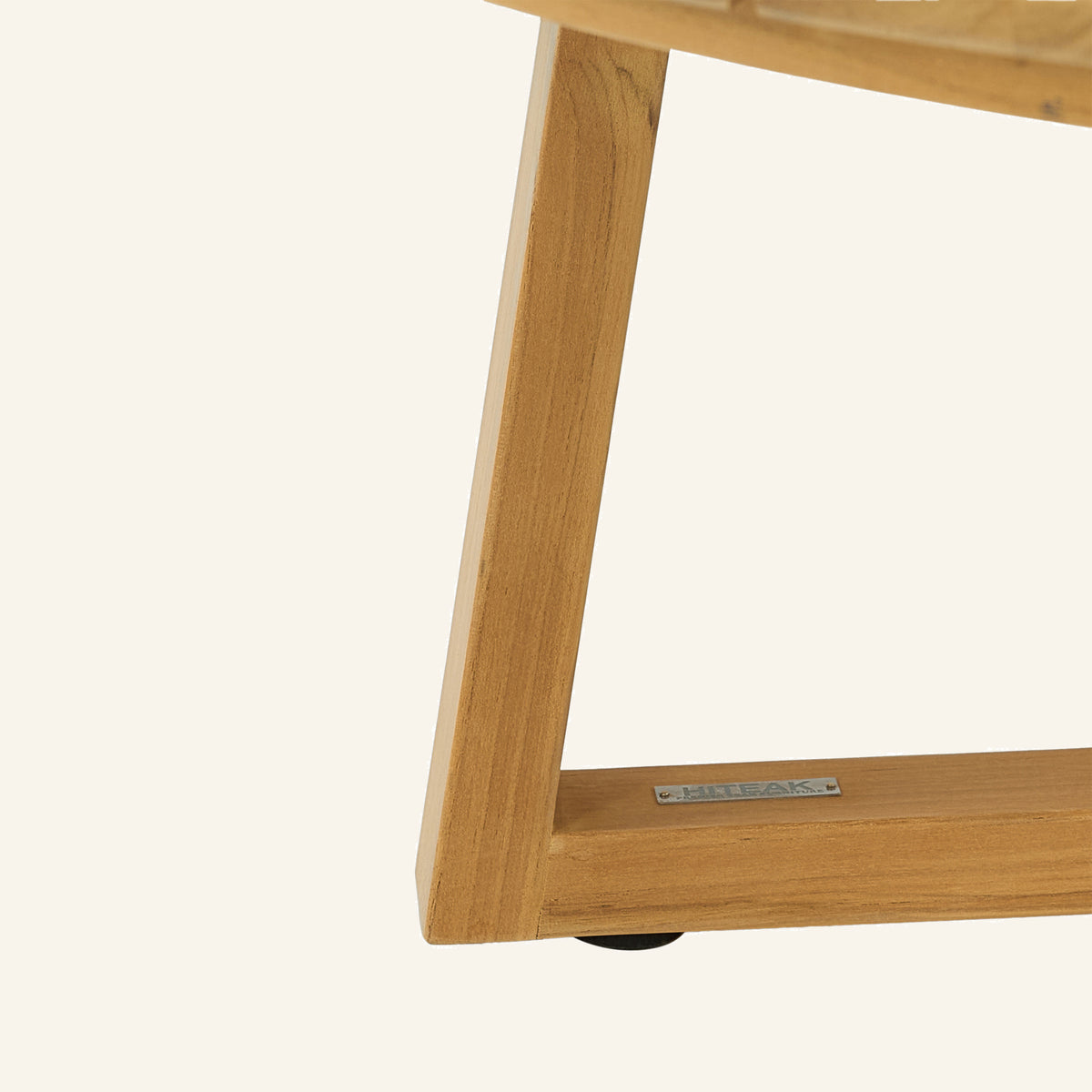 Solis coffee table detail, teak grain and mortise-and-tenon joinery