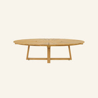 Solis coffee table from the side, solid teak tabletop and base