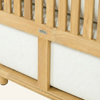 Solis sofa detail, cushion edge against the solid teak frame