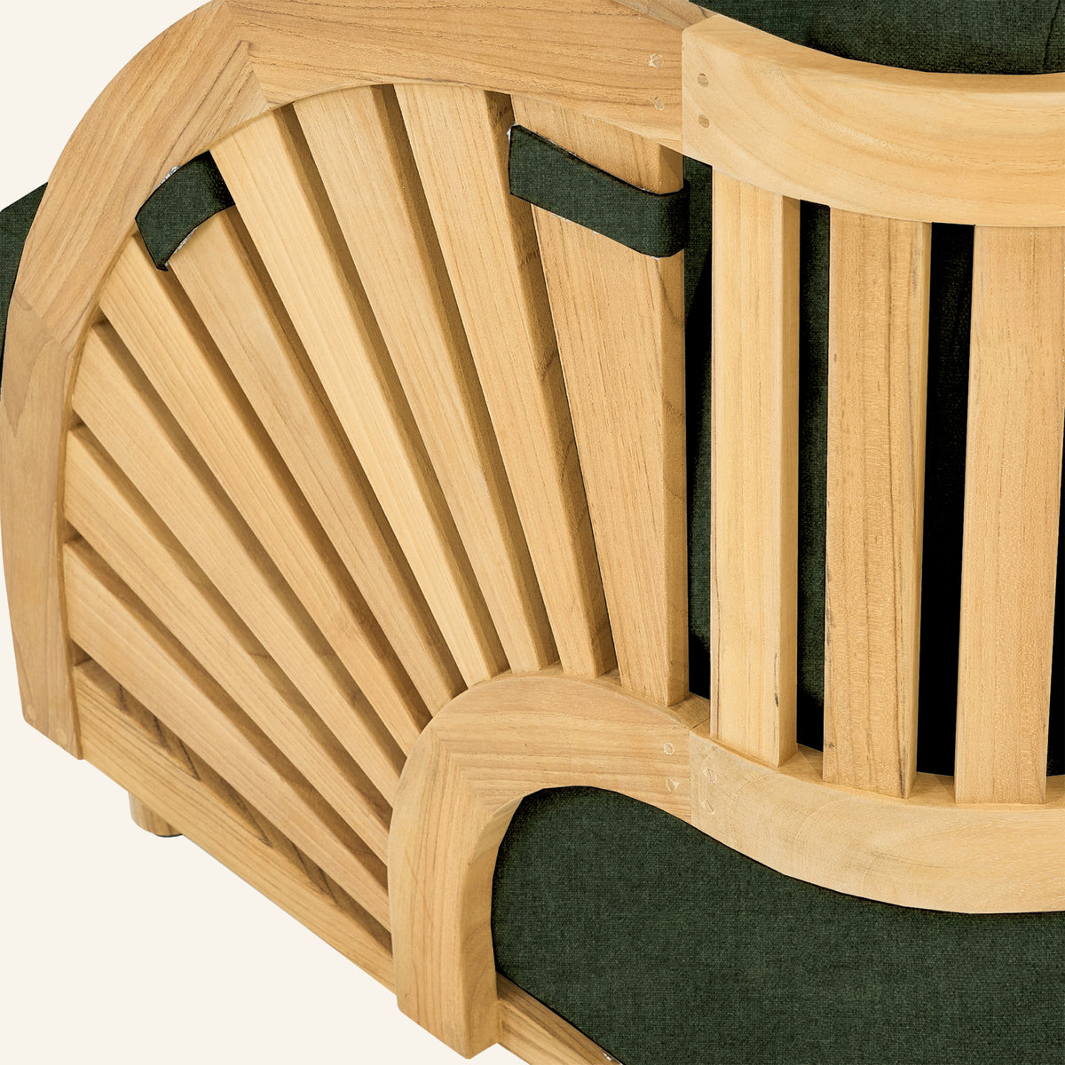 Solis sofa detail in Jungle, close view of the teak armrest