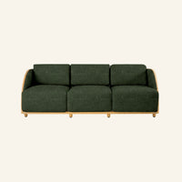 Solis sofa in Jungle, front view of the solid teak frame