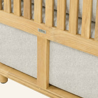 Solis sofa detail in Silver, cushion edge against the teak frame